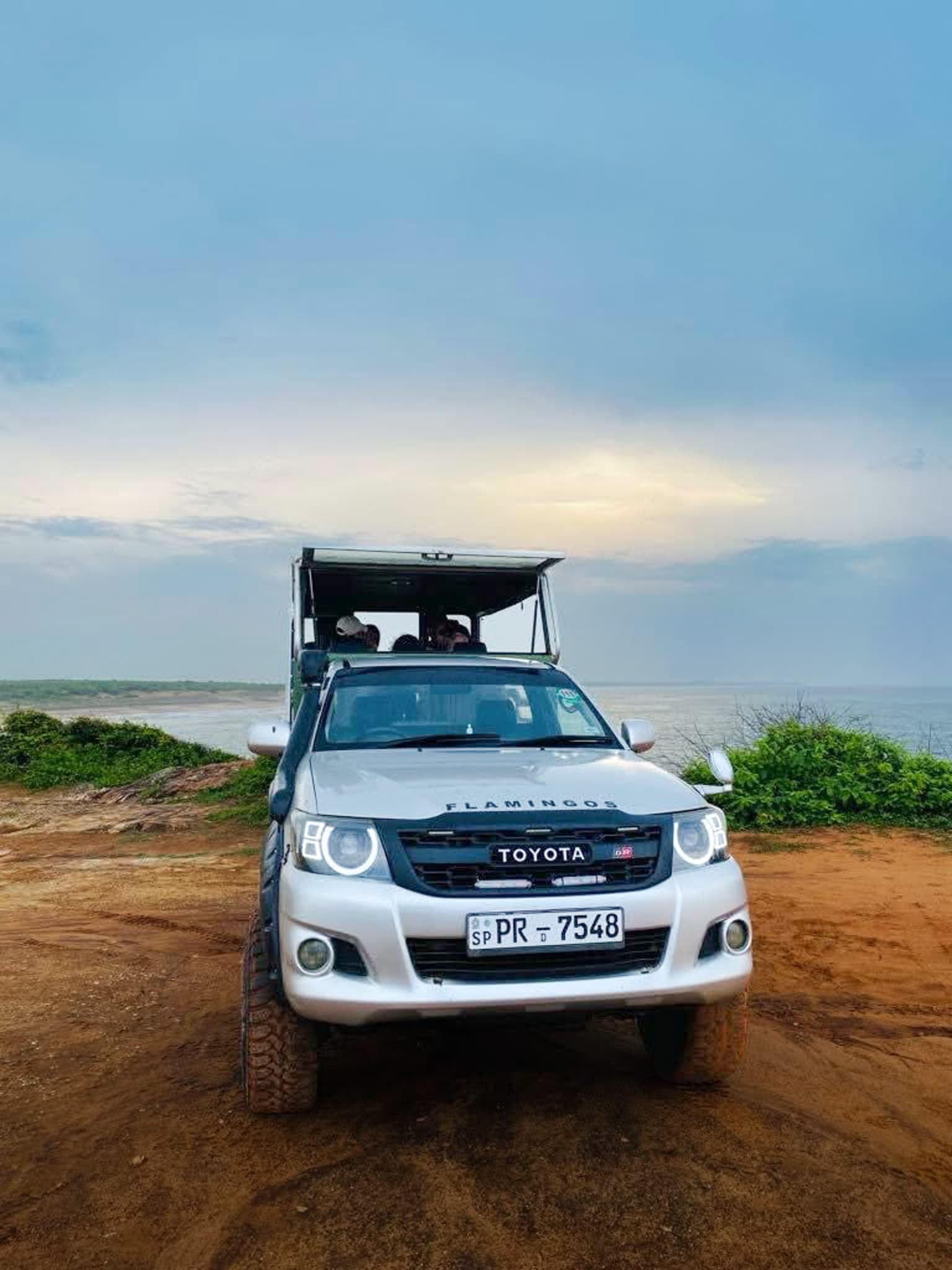 Safari jeep overlooking the coast